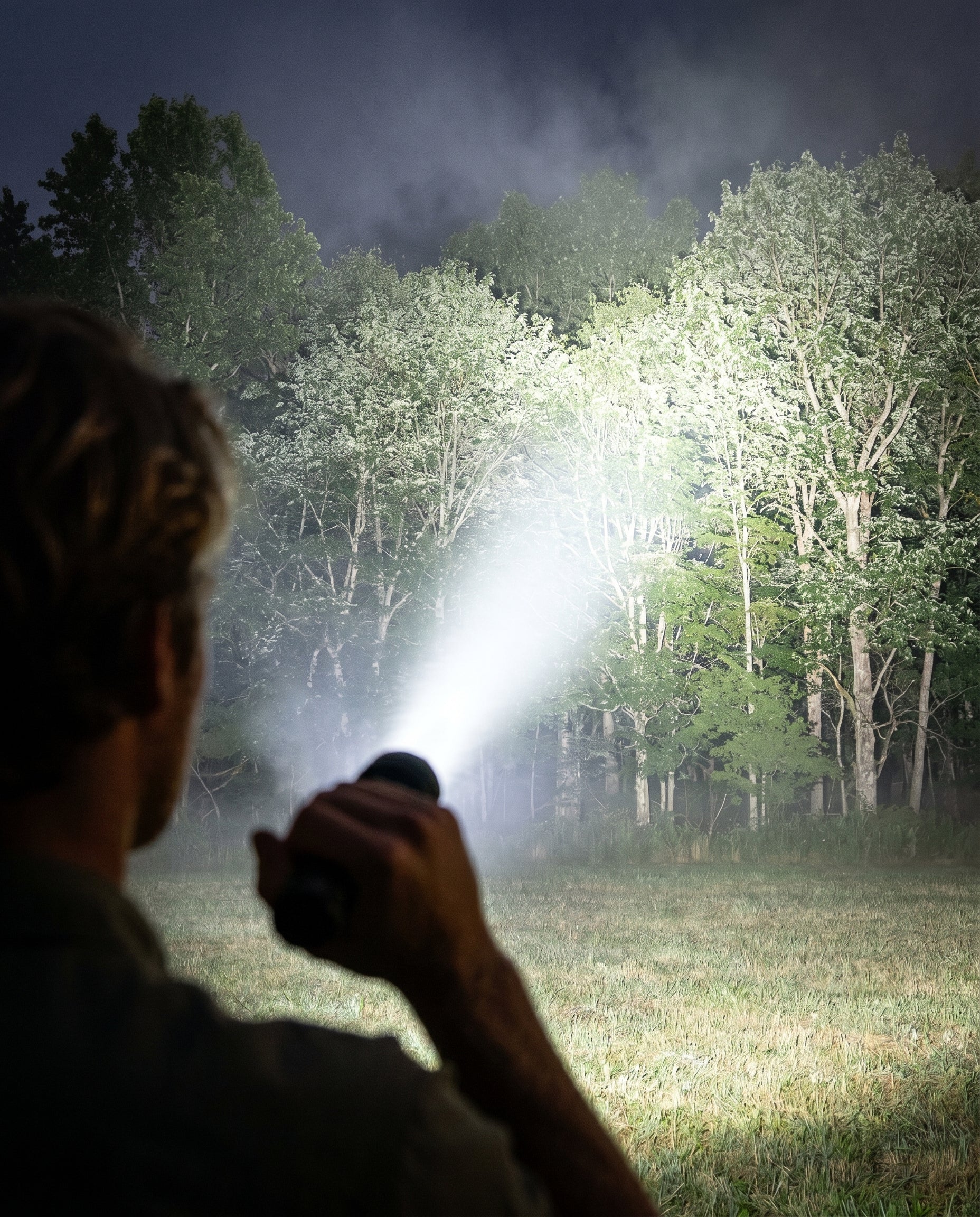 Sentinel 2000 flashlight beam lighting a dark outdoor area