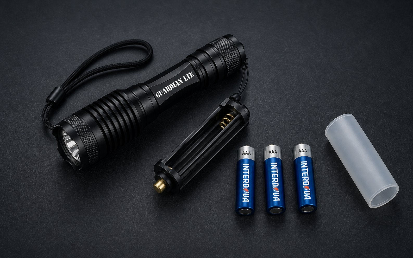 Guardian LTE with AAA batteries, AAA carrier, wrist strap, and 18650 sleeve