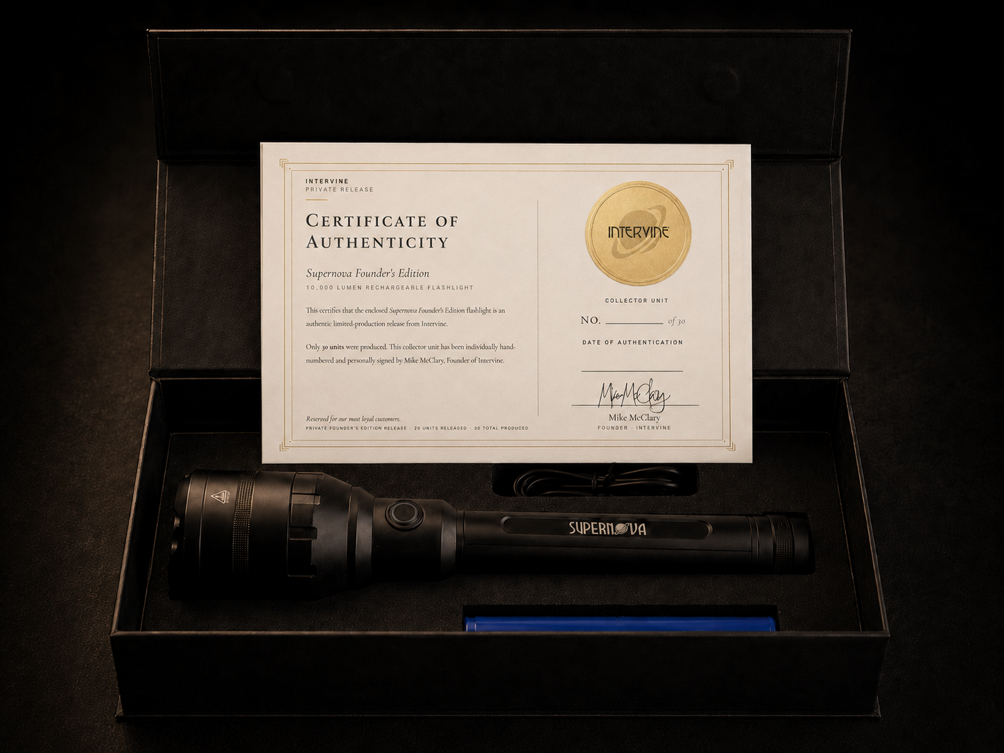 Open Supernova 10K Founder’s Edition magnetic gift box with flashlight, certificate, and charging cable